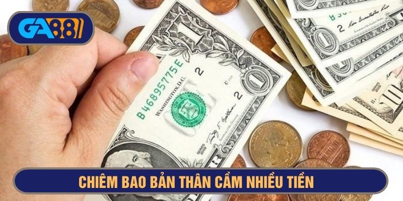 Nằm mơ thấy cầm tiền cần cẩn trọng khi đầu tư